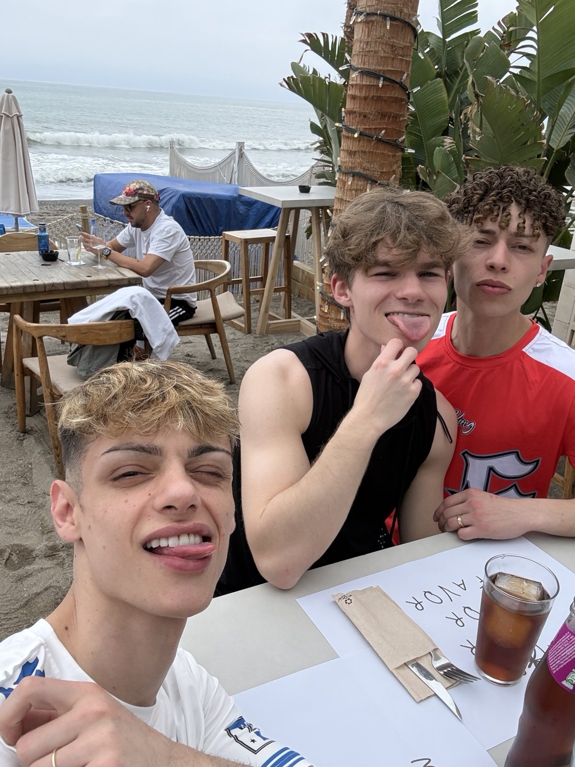 Friends together at a beachside restaurant